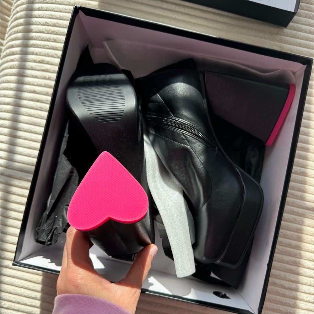 black boots with heart shaped heel
